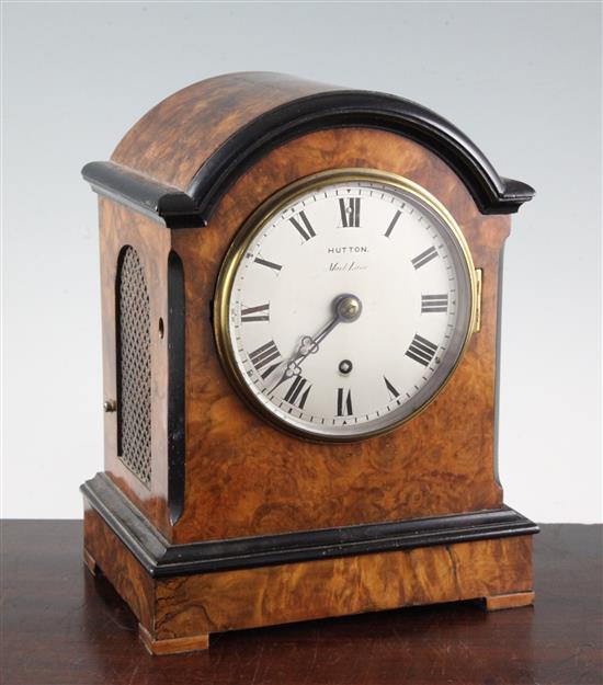 A Victorian ebonised and burr walnut single fusee mantel timepiece, 10.5in.